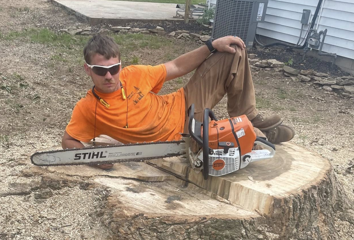 Tree service professional with STIHL chainsaw